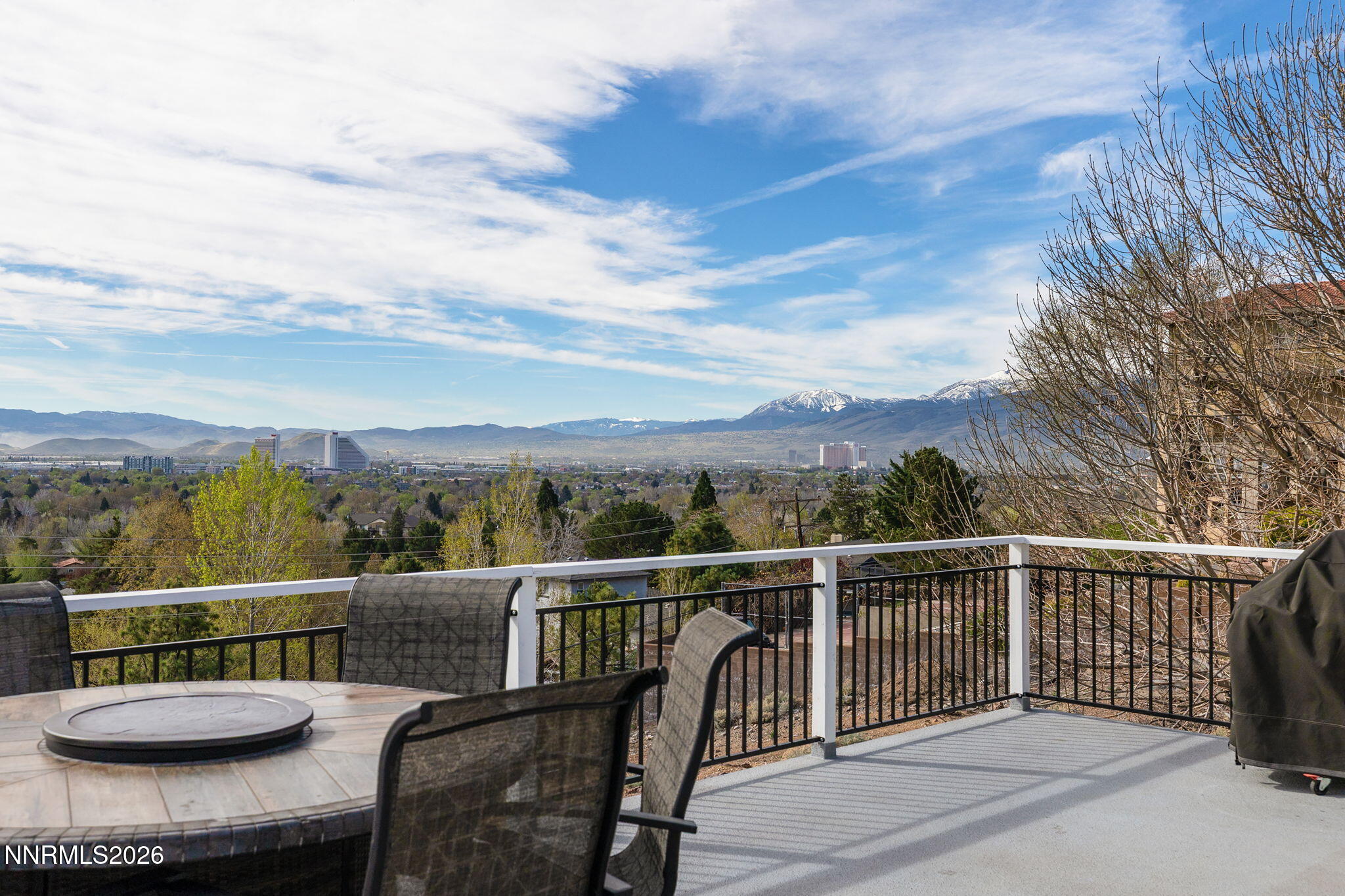5520 High Rock Way Sparks, NV 89431 - Photo 29 of 75 a view of a balcony with mountain view and wooden floor
