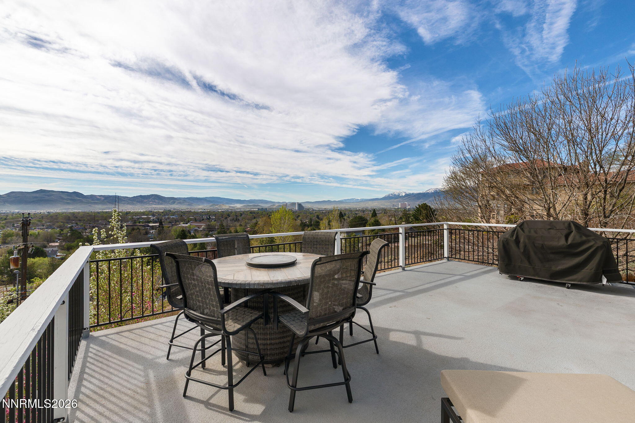5520 High Rock Way Sparks, NV 89431 - Photo 31 of 75 a view of a terrace with a table and chairs