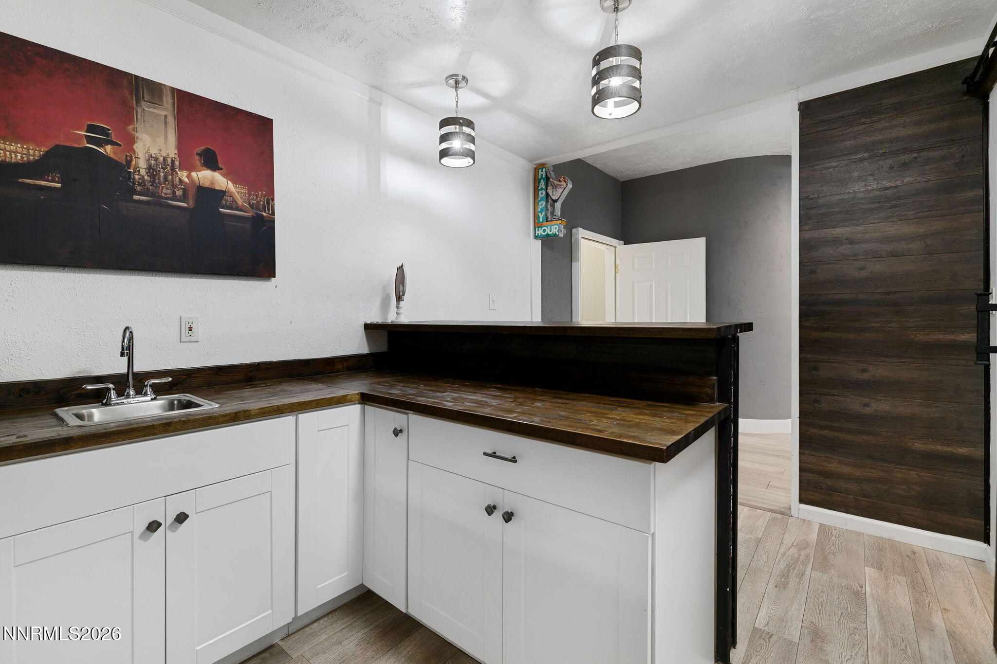 5520 High Rock Way Sparks, NV 89431 - Photo 51 of 75 a kitchen with a sink and a microwave