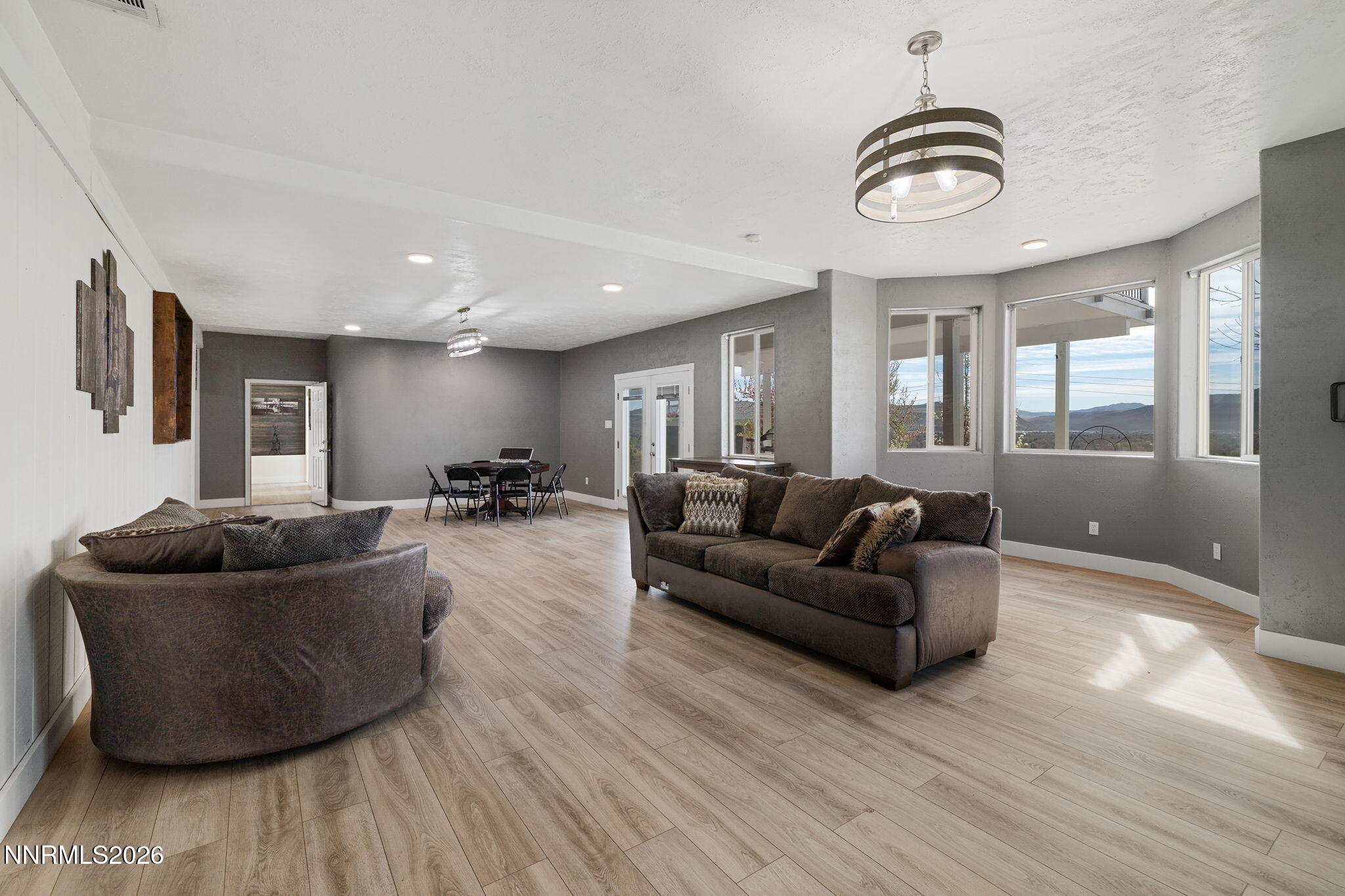 5520 High Rock Way Sparks, NV 89431 - Photo 55 of 75 a living room with furniture and a wooden floor
