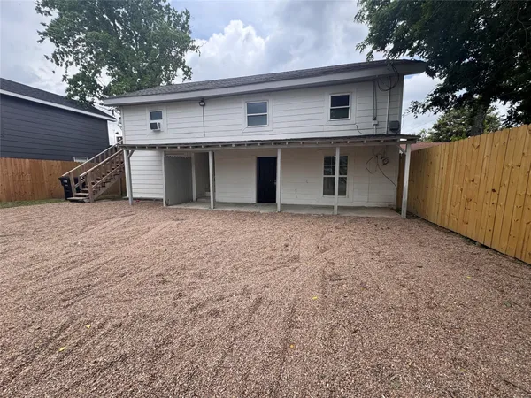 a view of a house with a garage