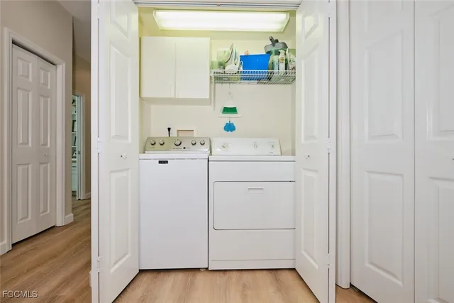 a bathroom with a sink vanity and mirror