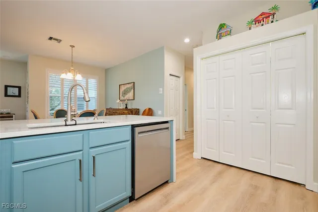 a living room with furniture a dining table and a fireplace