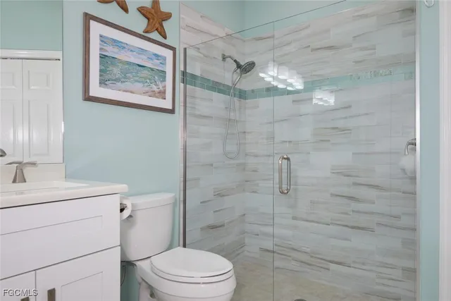 a bathroom with a sink vanity and a mirror