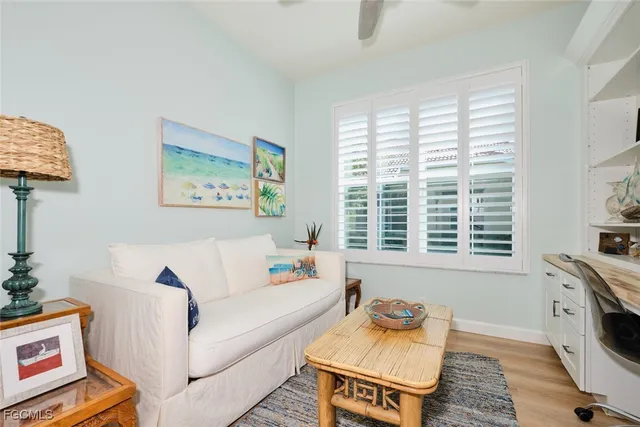 a workspace with furniture and a window