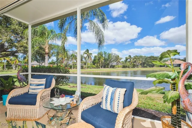 a view of swimming pool with outdoor seating