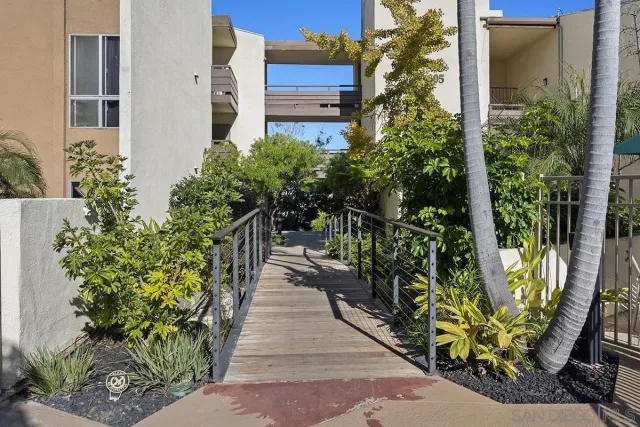 a view of a potted plants with brick walls