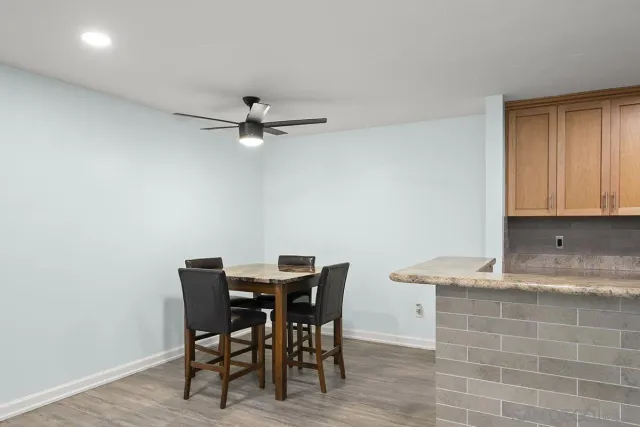 a view of a workspace with furniture