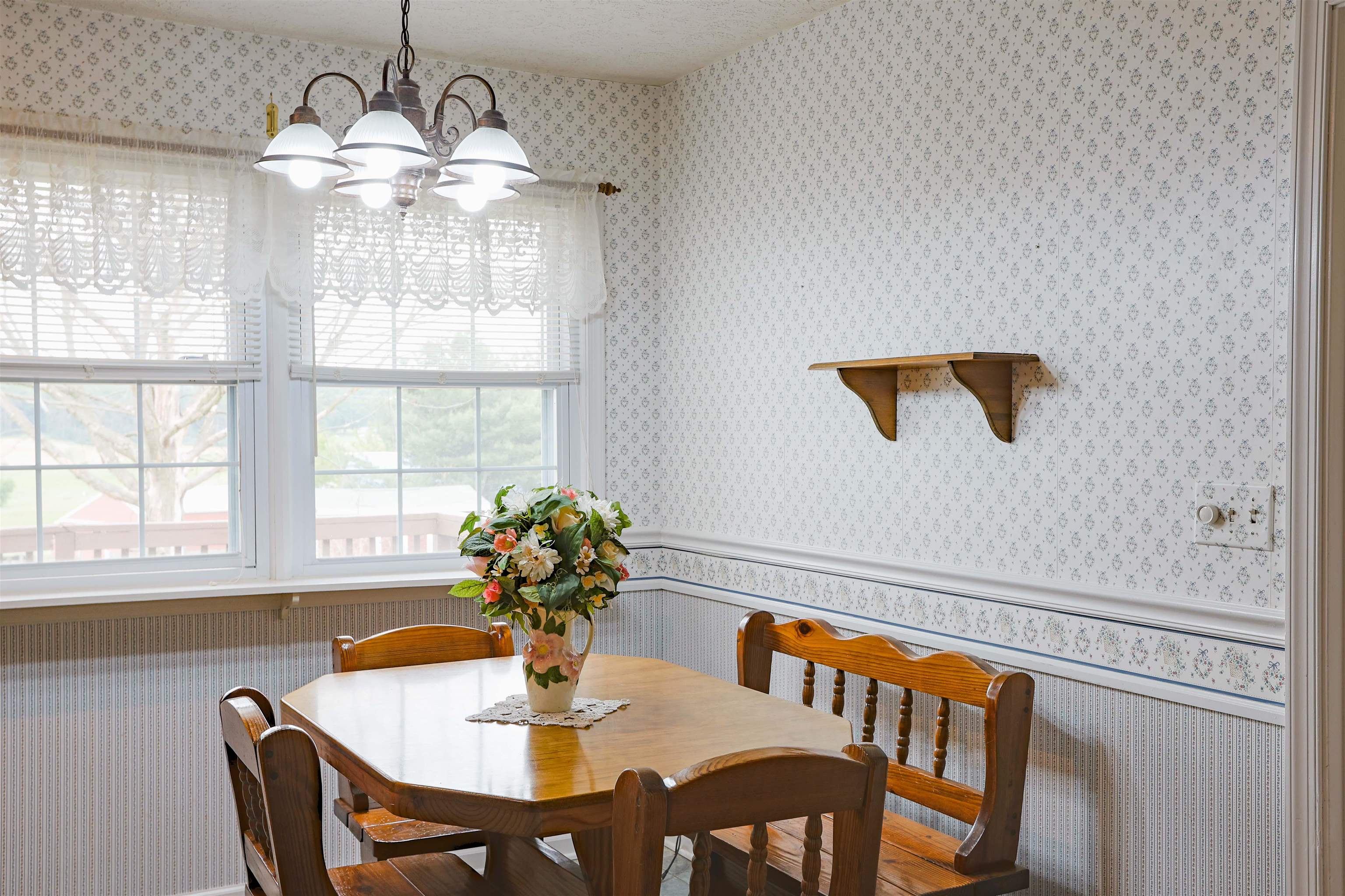 839 Kiddsville Road Waynesboro, VA 22980 - Photo 17 of 49 a dining room with furniture a chandelier and window