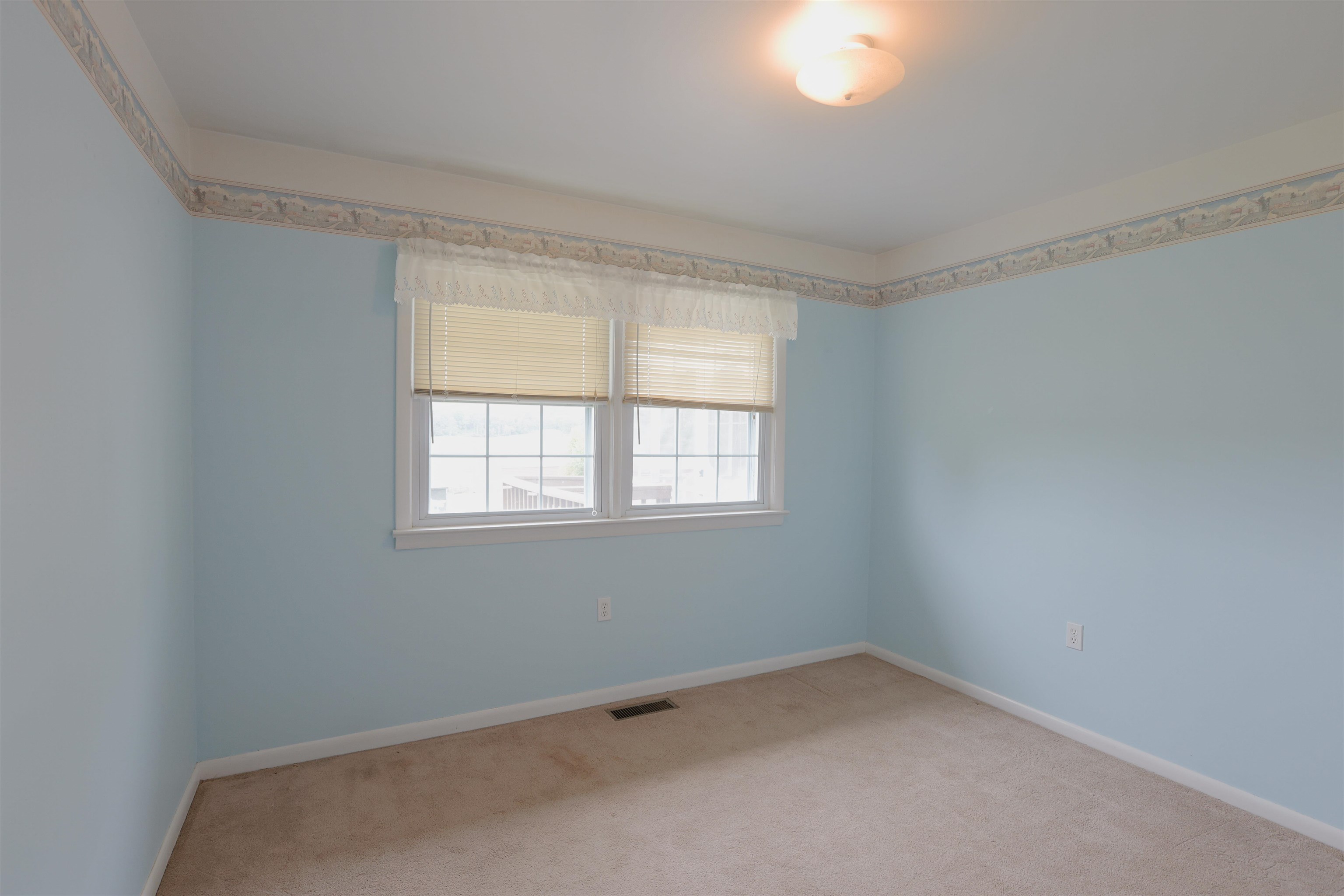 839 Kiddsville Road Waynesboro, VA 22980 - Photo 23 of 49 an empty room with a window