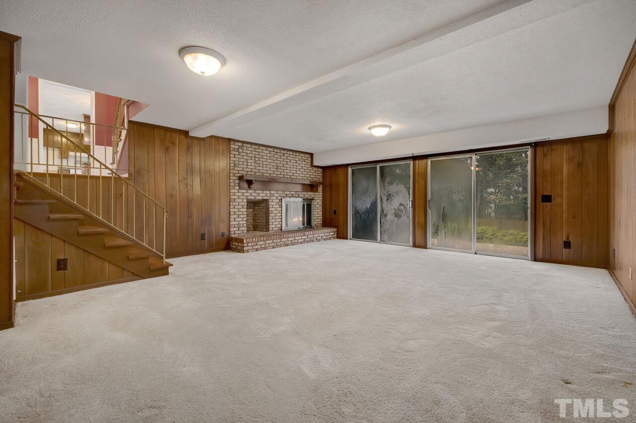 3413 Malibu Drive Raleigh, NC 27607 - Photo 11 of 30 a view of an empty room with a window