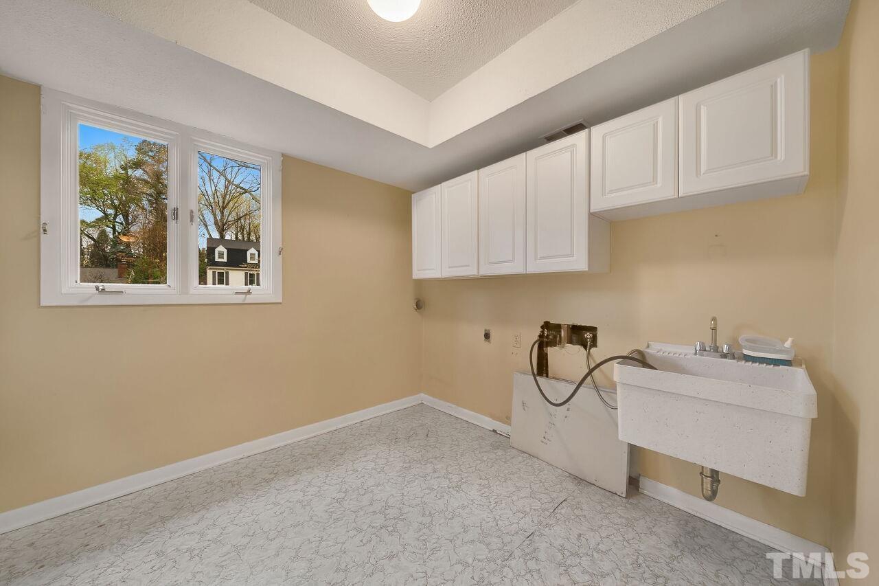 3413 Malibu Drive Raleigh, NC 27607 - Photo 14 of 30 a room with storage and utility