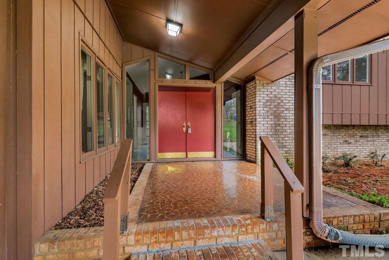 3413 Malibu Drive Raleigh, NC 27607 - Photo 25 of 30 a view of an entryway door