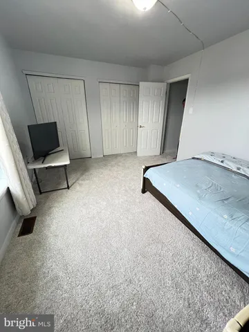 a view of a livingroom with furniture