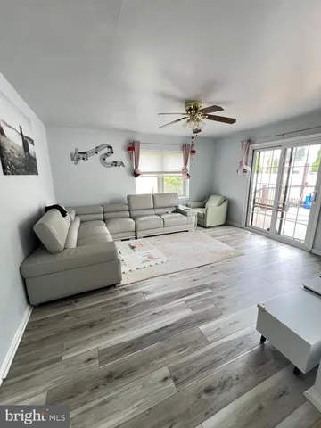 a spacious bedroom with a bed and a couch