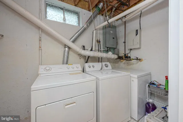 a utility room with dryer and washer