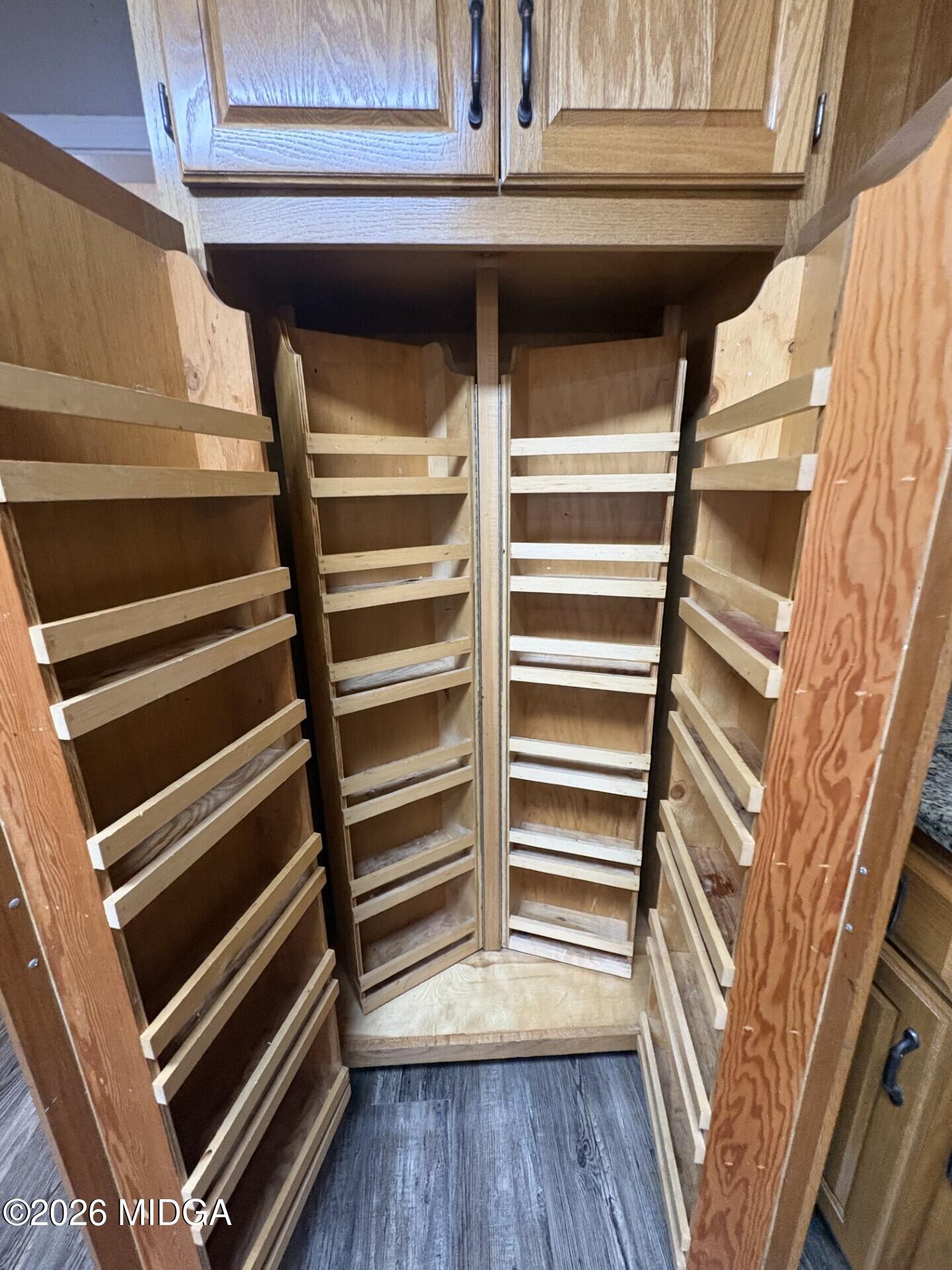 5081 Marshall Mill Road Lizella, GA 31052 - Photo 15 of 40 a view of walk in closet with empty racks