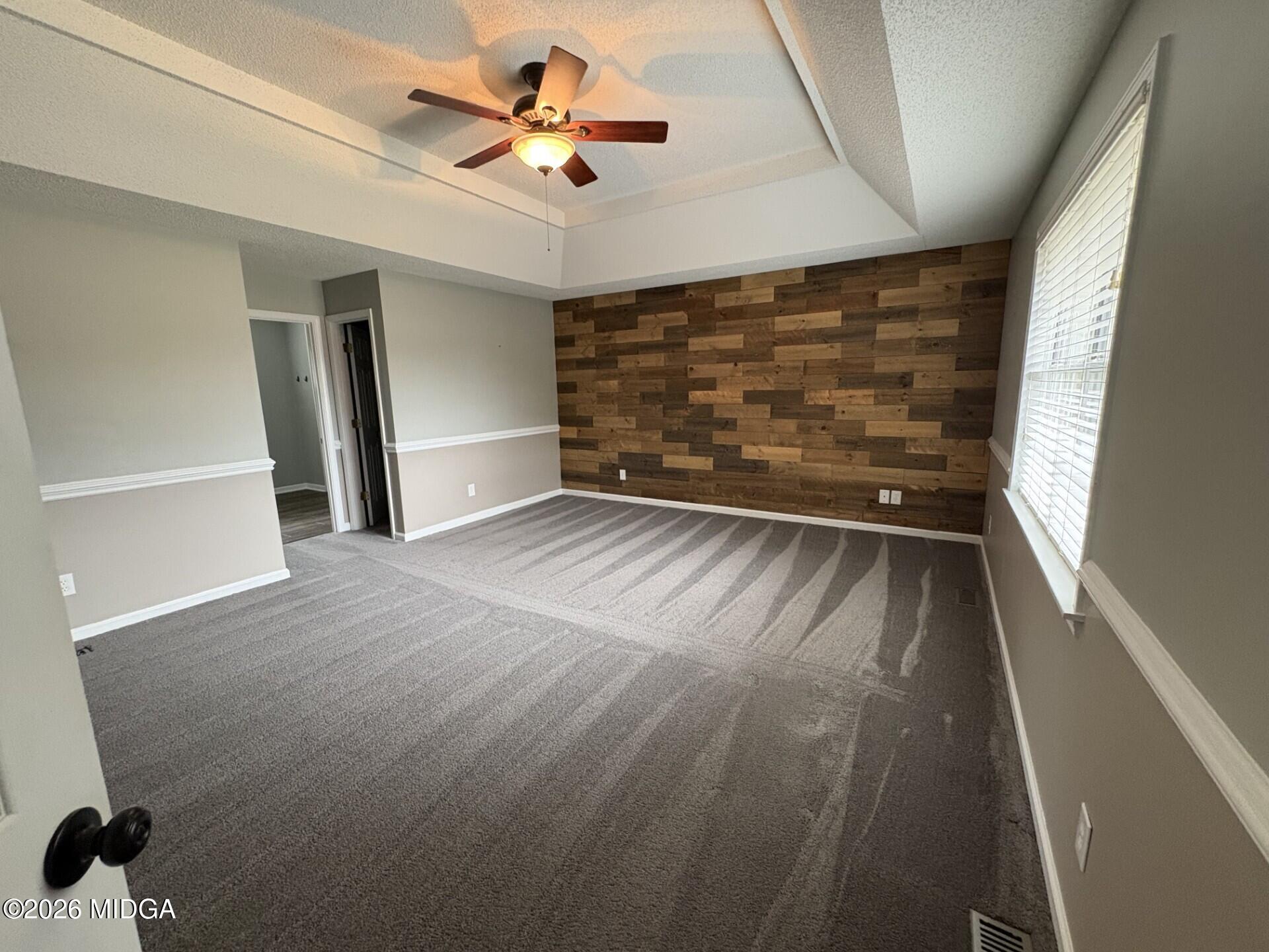 5081 Marshall Mill Road Lizella, GA 31052 - Photo 19 of 40 a view of an empty room with a window