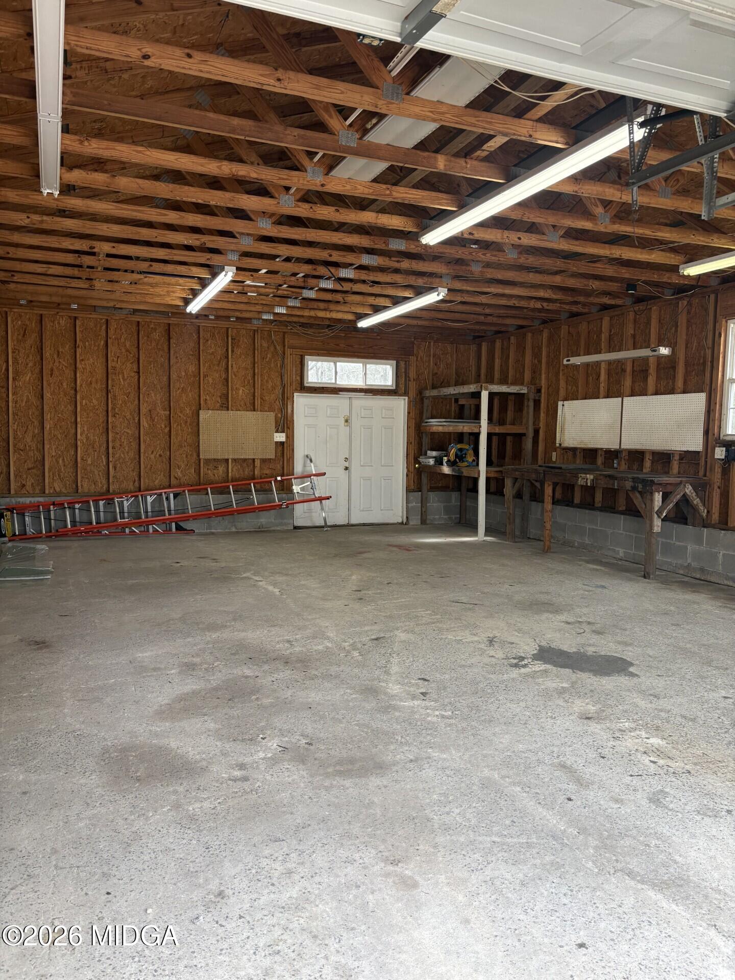 5081 Marshall Mill Road Lizella, GA 31052 - Photo 36 of 40 a view of a room with wooden walls