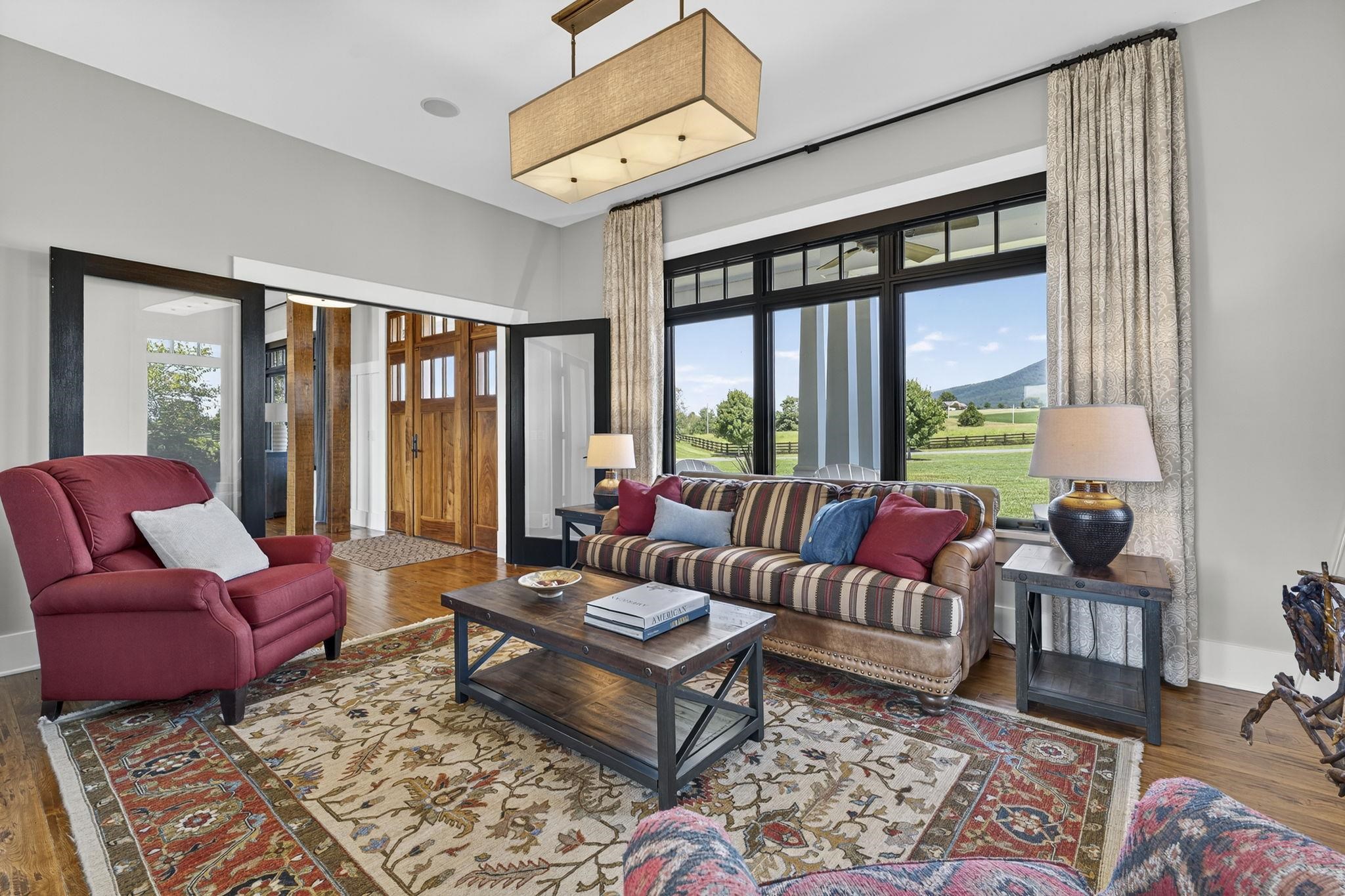1614 Three Springs Road McGaheysville, VA 22840 - Photo 17 of 75 a living room with furniture and a large window