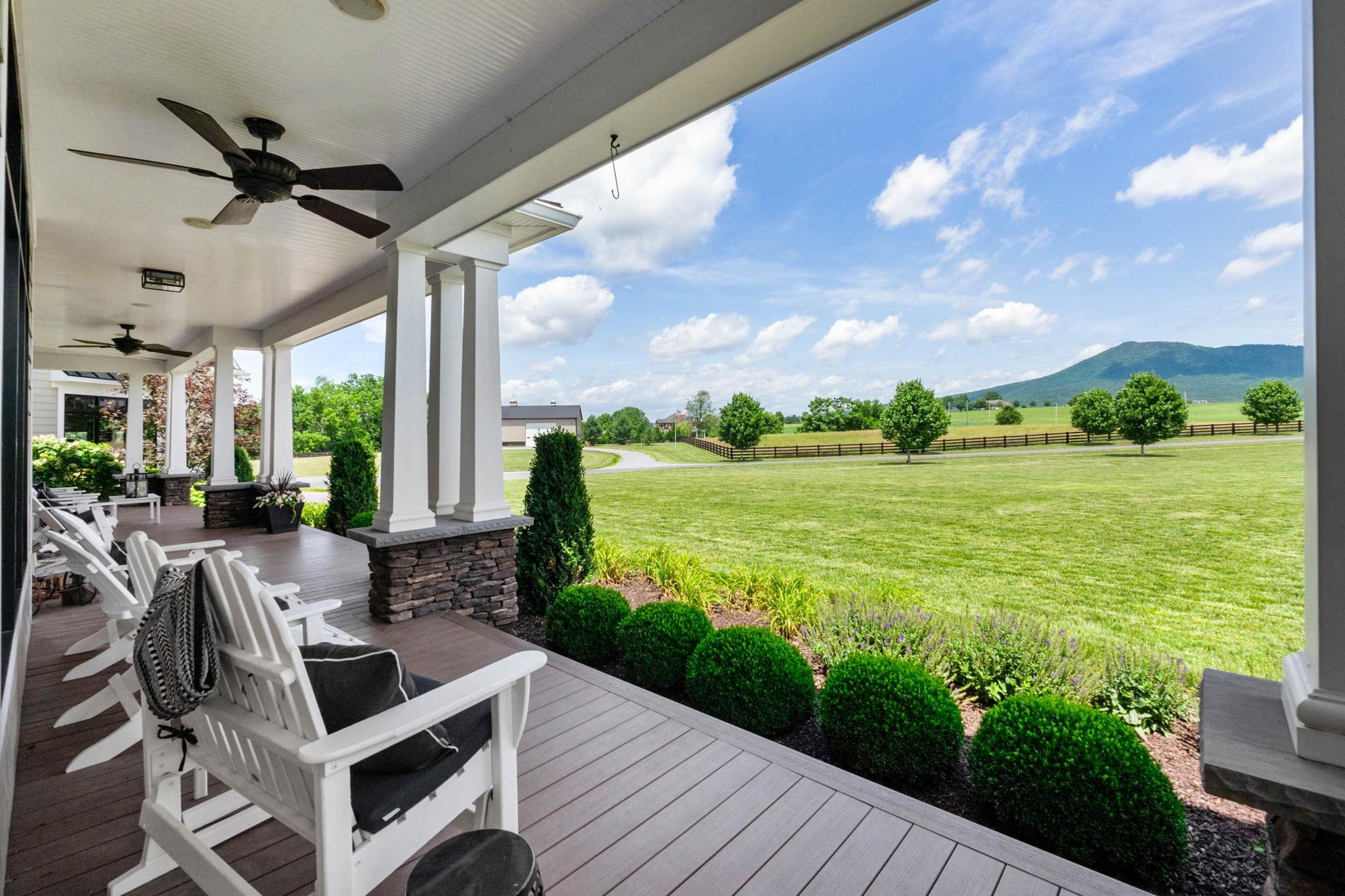1614 Three Springs Road McGaheysville, VA 22840 - Photo 3 of 75 a view of a patio with a table chairs and garden view