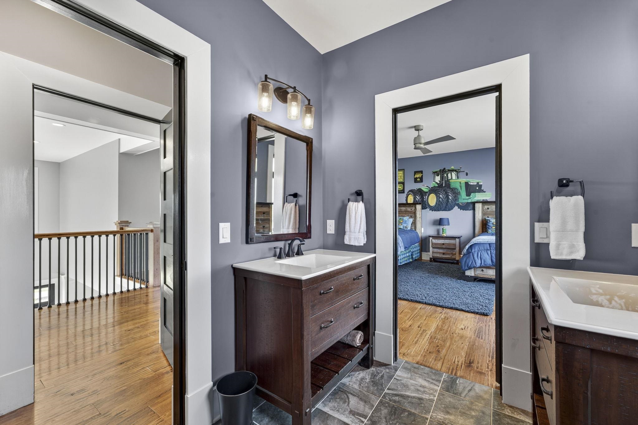 1614 Three Springs Road McGaheysville, VA 22840 - Photo 35 of 75 a en suite bathroom with a granite countertop sink and a mirror