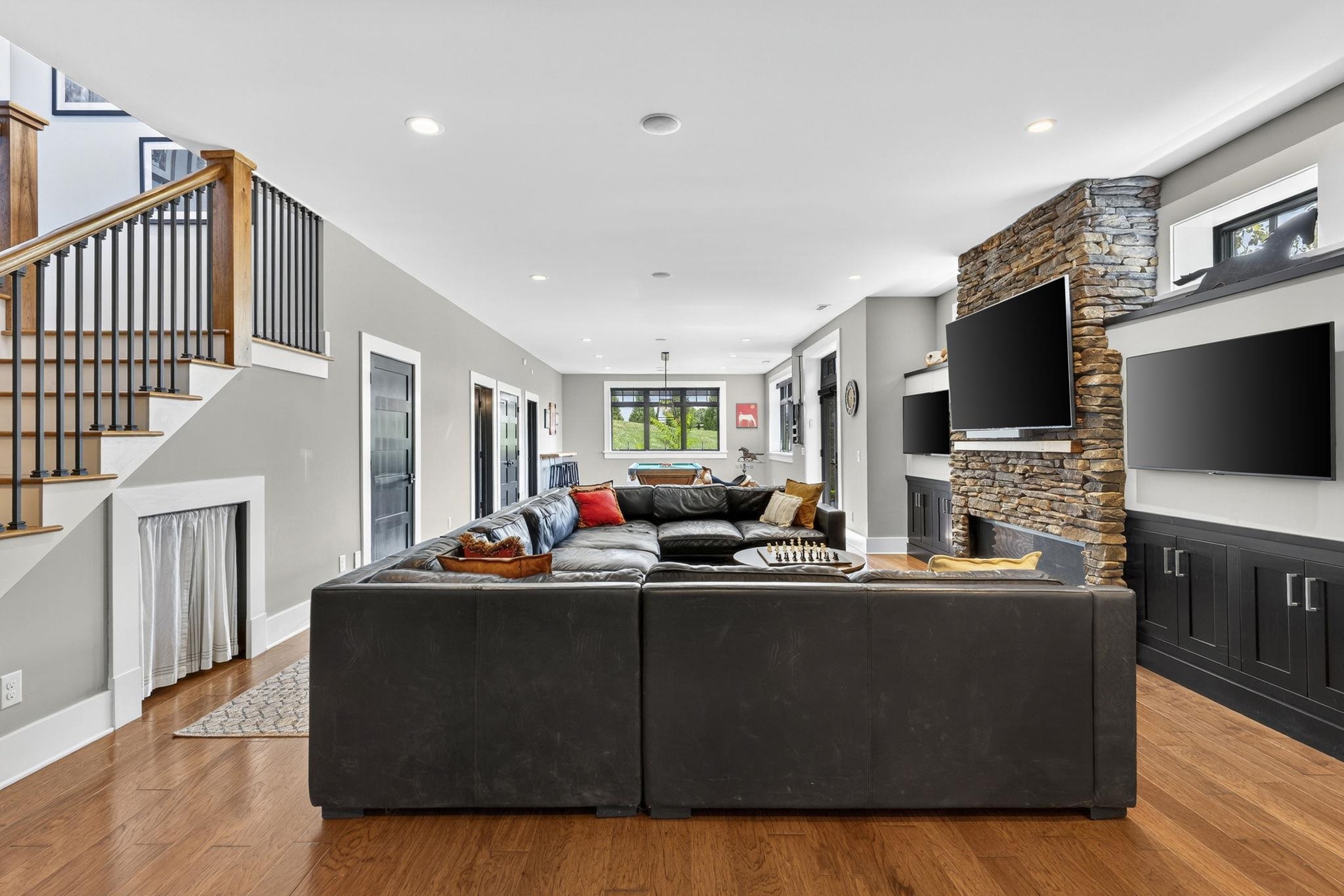 1614 Three Springs Road McGaheysville, VA 22840 - Photo 46 of 75 a living room with fireplace furniture and a flat screen tv