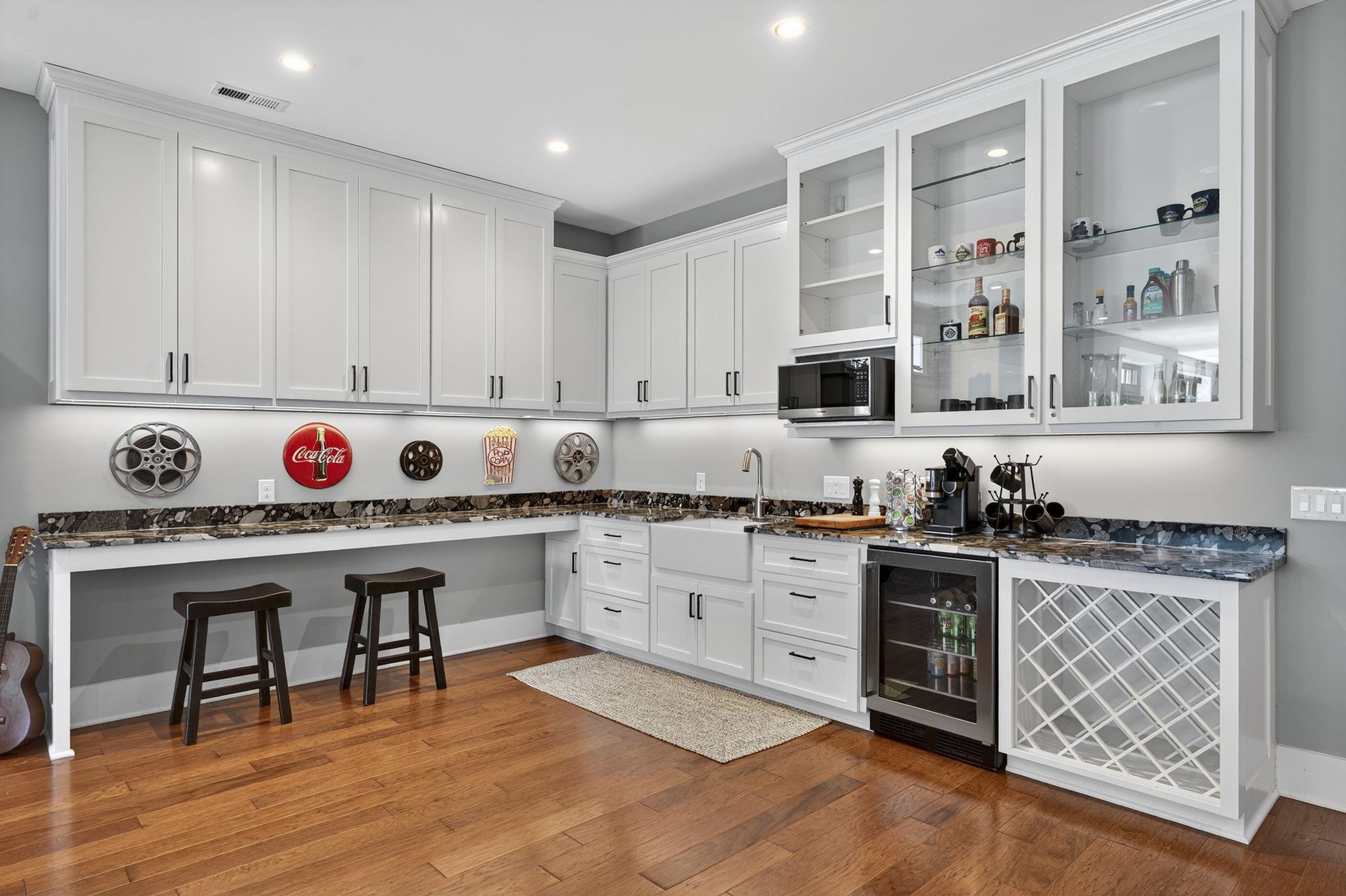 1614 Three Springs Road McGaheysville, VA 22840 - Photo 47 of 75 a kitchen with granite countertop a stove top oven sink and cabinets