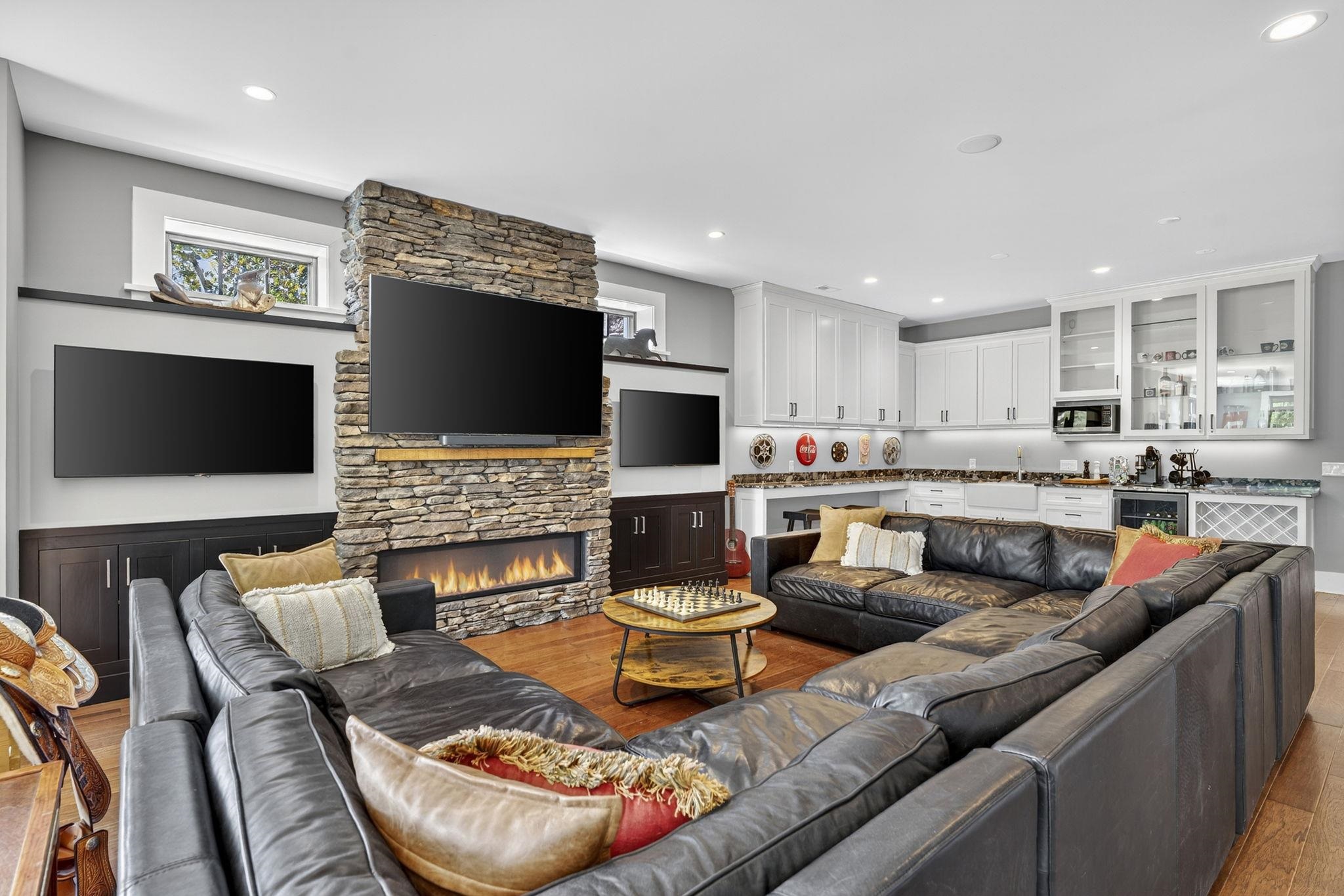 1614 Three Springs Road McGaheysville, VA 22840 - Photo 48 of 75 a living room with fireplace furniture and a flat screen tv