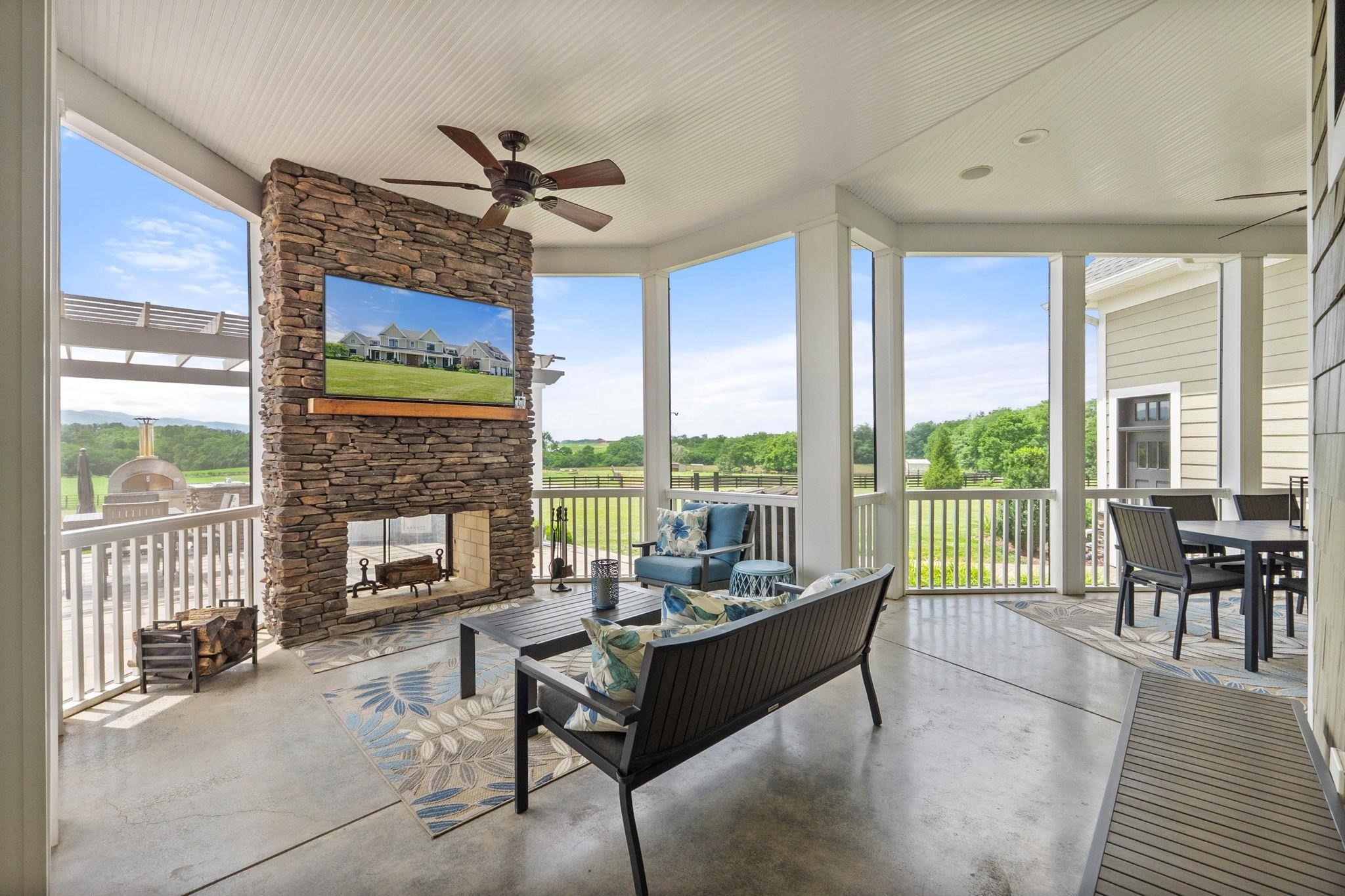 1614 Three Springs Road McGaheysville, VA 22840 - Photo 55 of 75 a living room with furniture and a floor to ceiling window