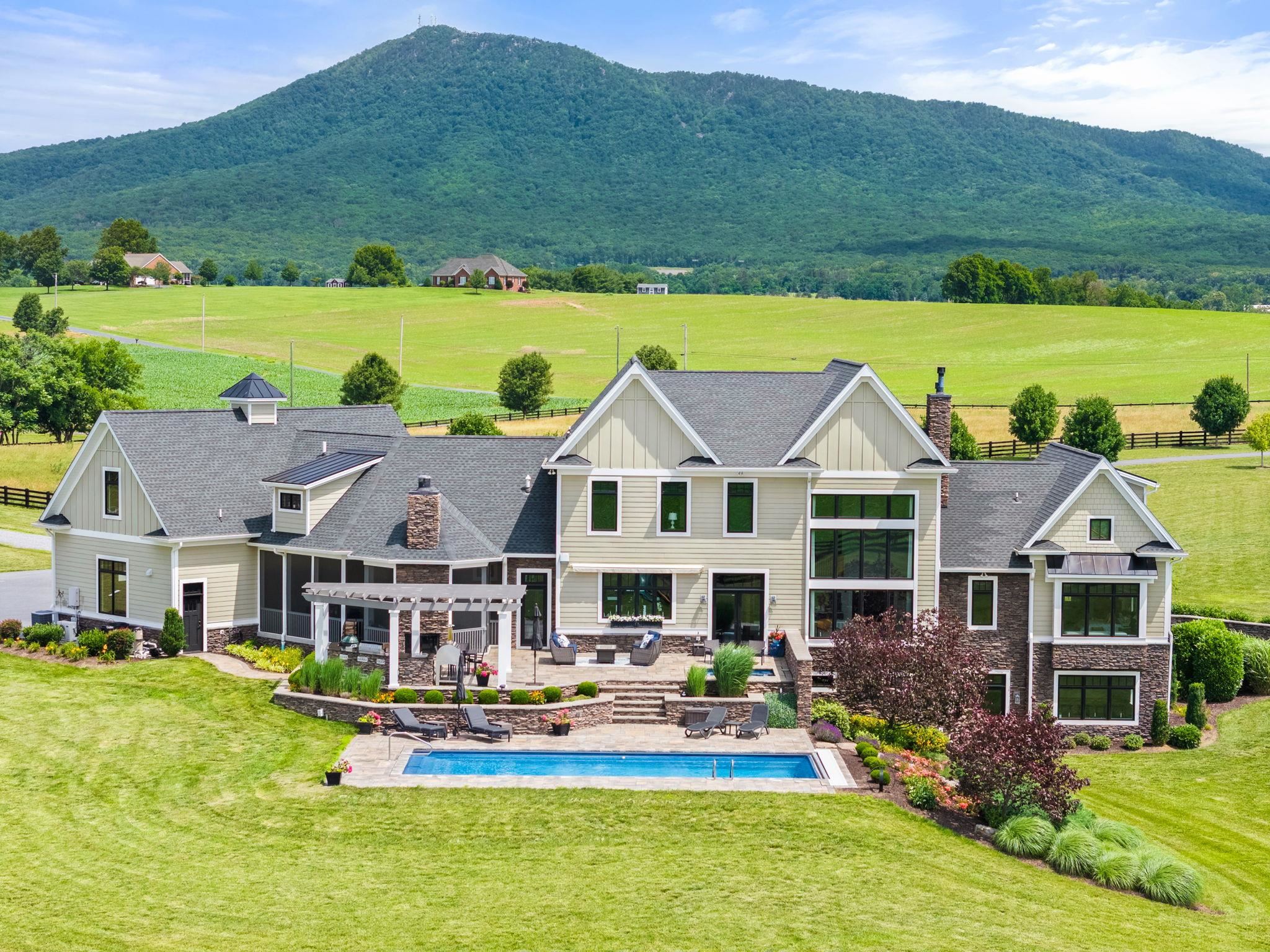 1614 Three Springs Road McGaheysville, VA 22840 - Photo 60 of 75 a aerial view of a house with a big yard and potted plants