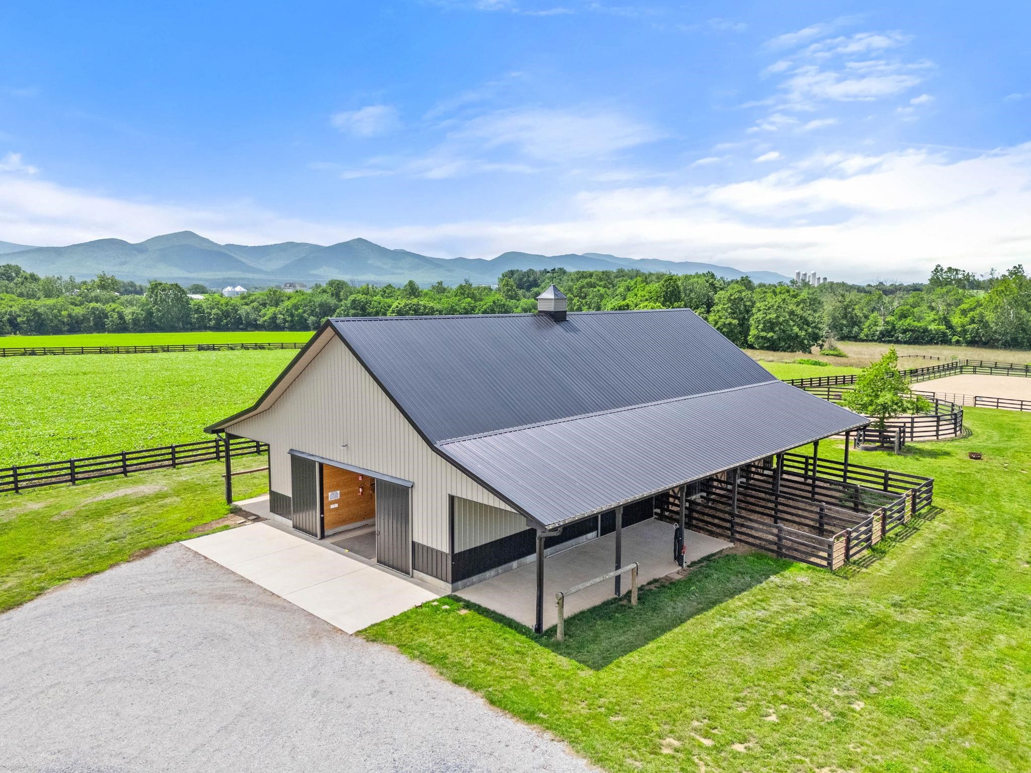 1614 Three Springs Road McGaheysville, VA 22840 - Photo 62 of 75 a aerial view of a house with a yard and lake view