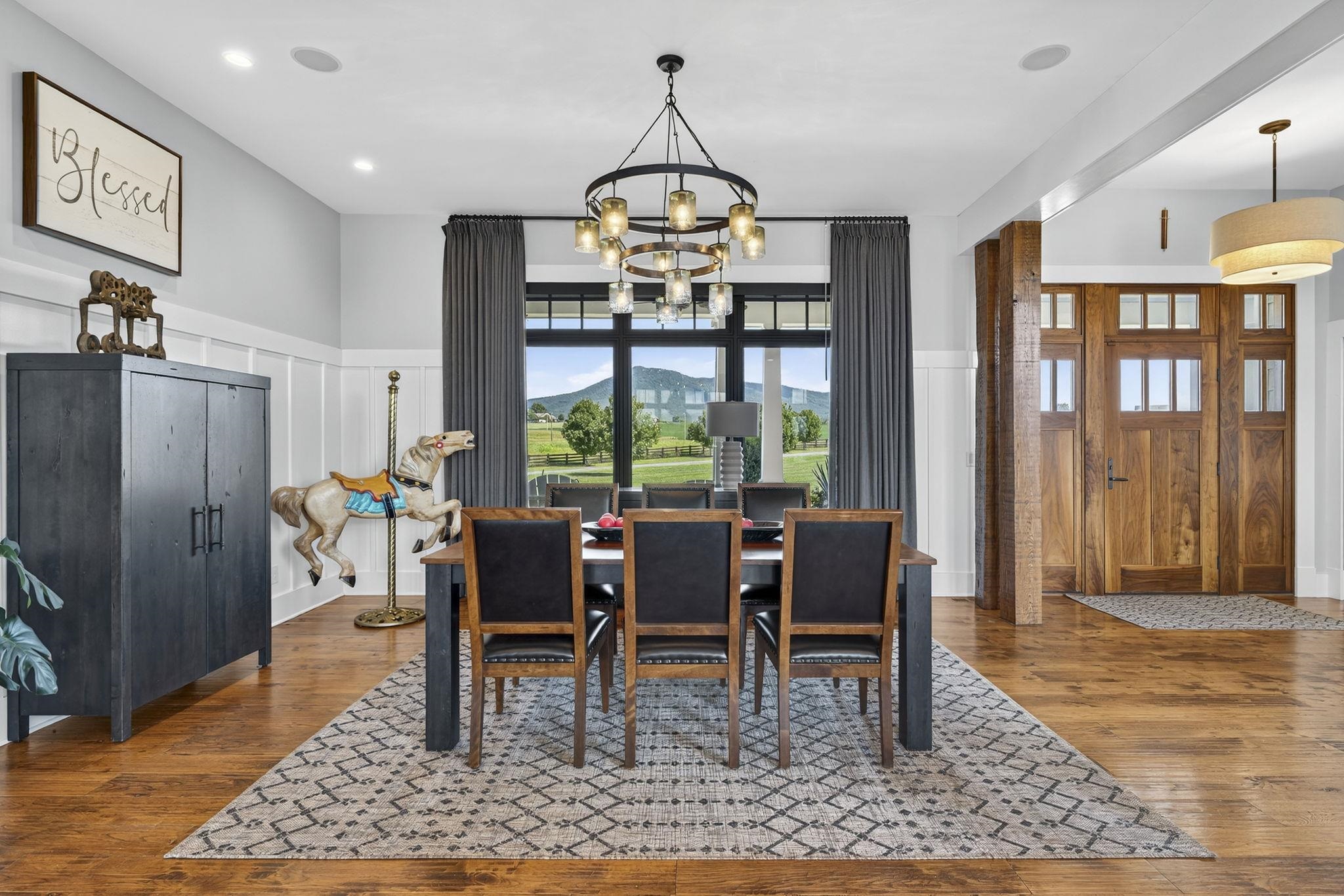 1614 Three Springs Road McGaheysville, VA 22840 - Photo 8 of 75 a dining room with wooden floor a chandelier