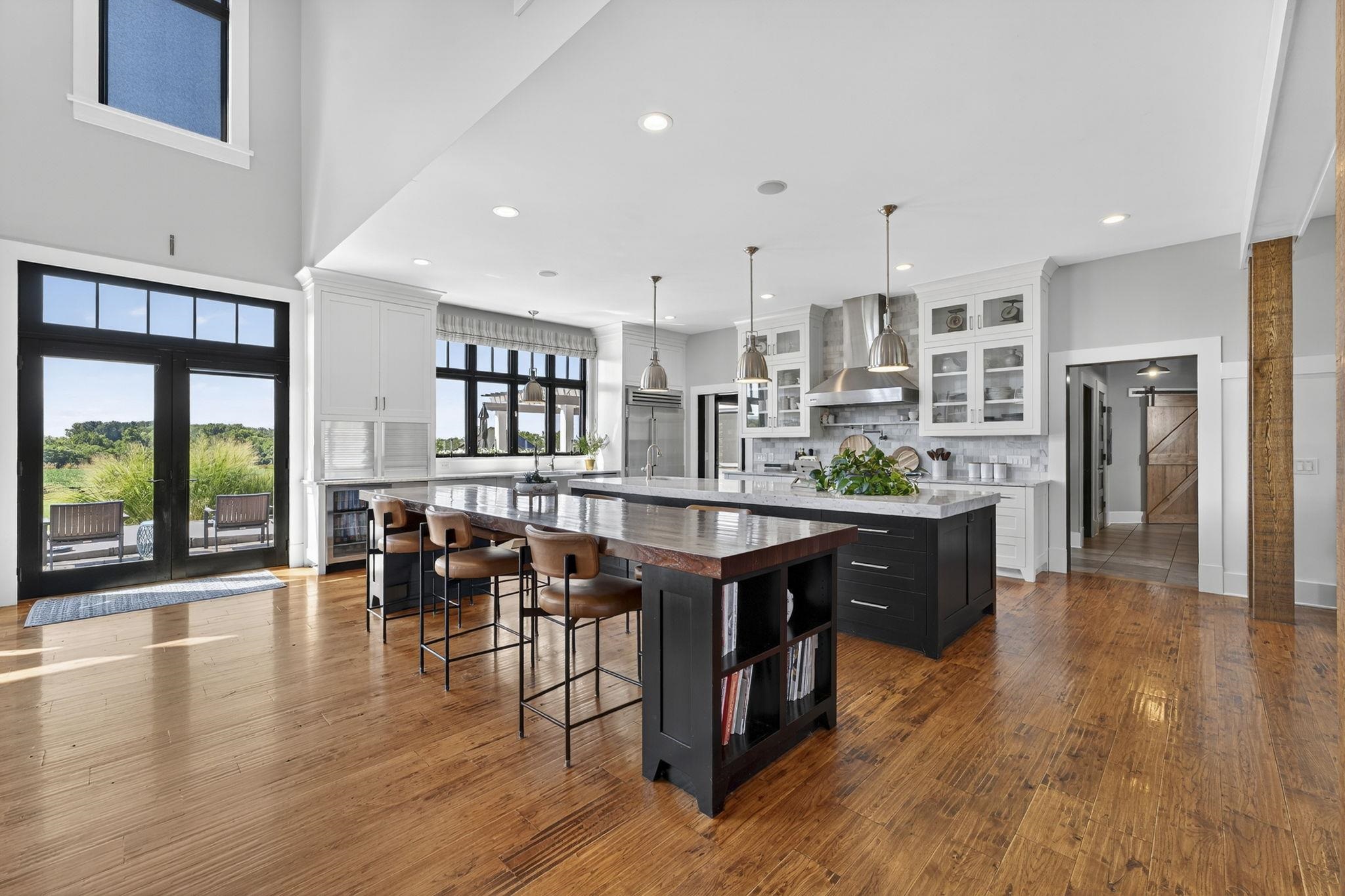 1614 Three Springs Road McGaheysville, VA 22840 - Photo 9 of 75 a living room with stainless steel appliances granite countertop furniture wooden floor and a kitchen view