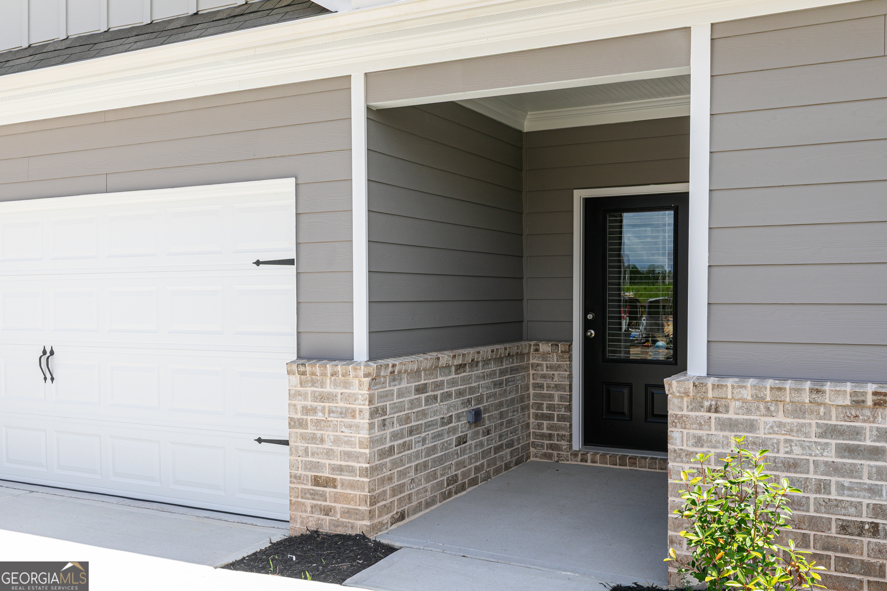 516 Plant Road Conyers, GA 30013 - Photo 3 of 11 a view of front door of house