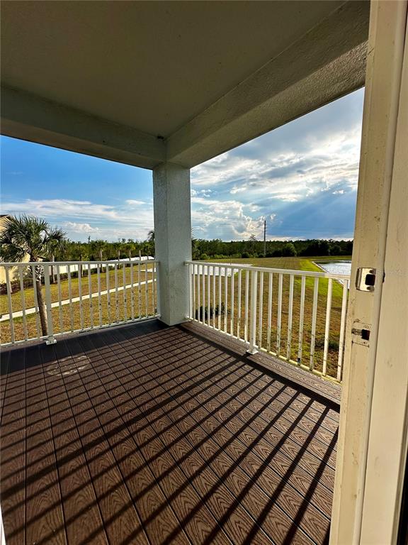 12351 Northover Loop Orlando, FL 32824 - Photo 42 of 58 a view of a balcony with an ocean view