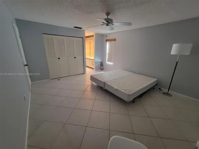 a living room with a couch and a table