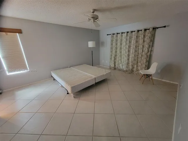 a living room with a couch and a table