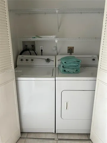 a reading room with furniture and wooden floor