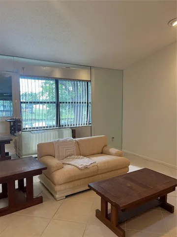 a living room with a couch and a table