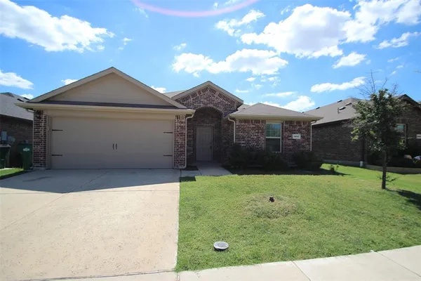 a front view of house with yard