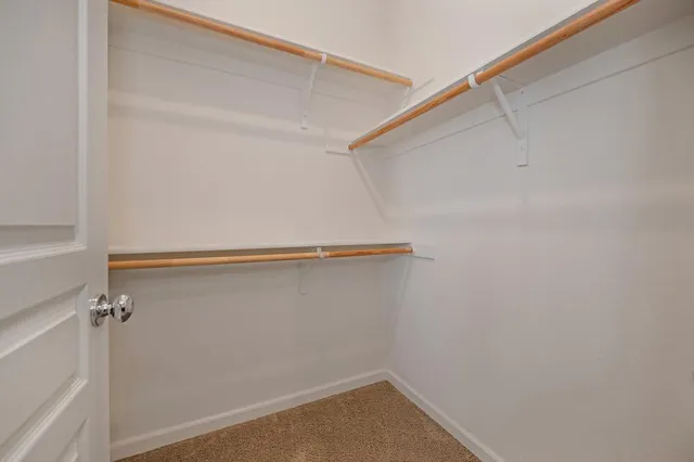 a view of a room with racks on the wall