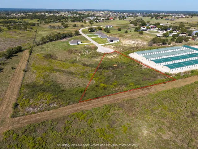 an aerial view of a tennis ground