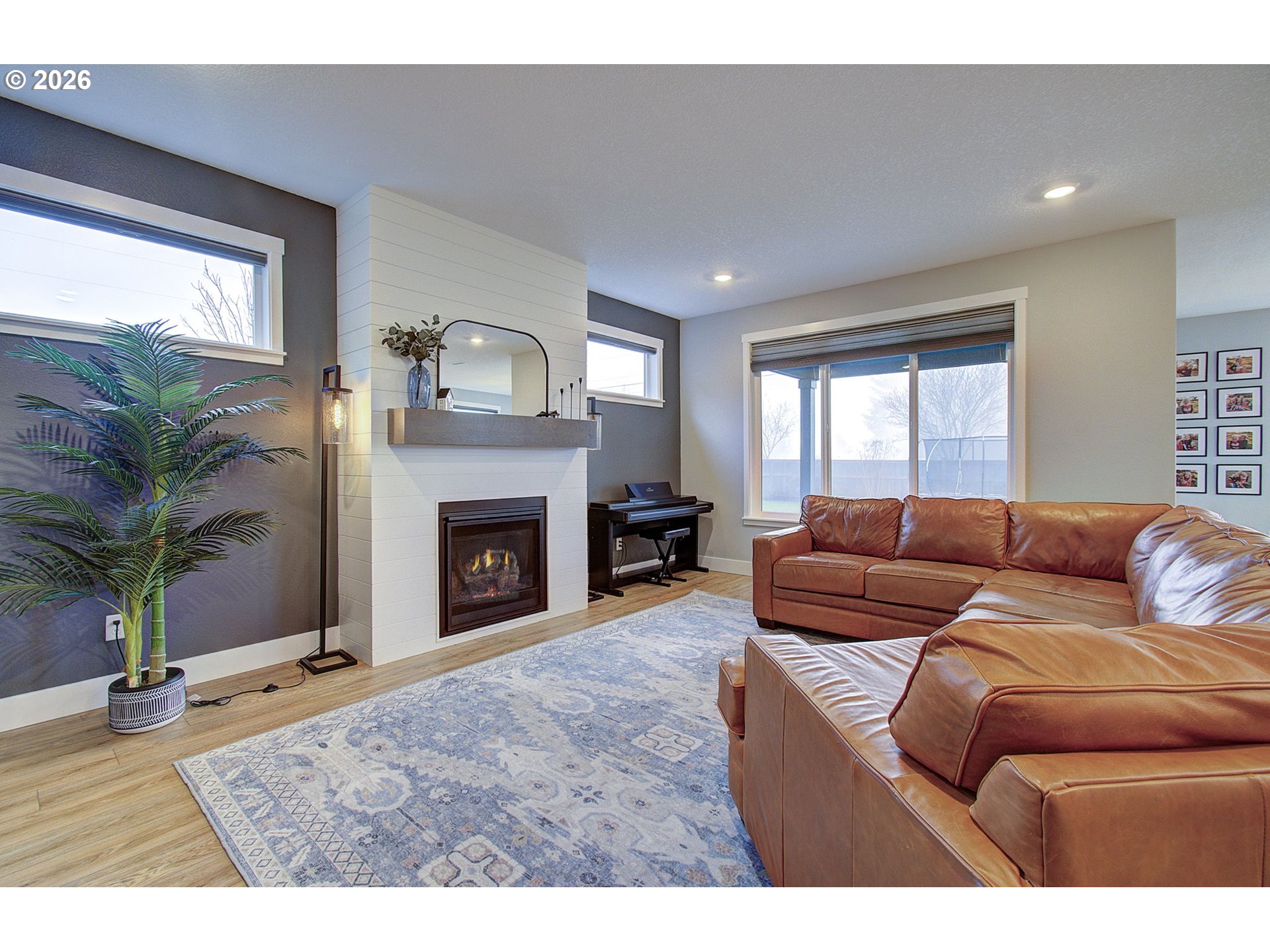 2831 Northeast 9th Avenue Battle Ground, WA 98604 - Photo 11 of 43 a living room with furniture and a fireplace