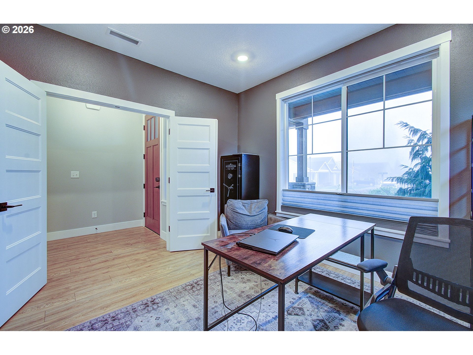 2831 Northeast 9th Avenue Battle Ground, WA 98604 - Photo 13 of 43 a workspace room with furniture and wooden floor