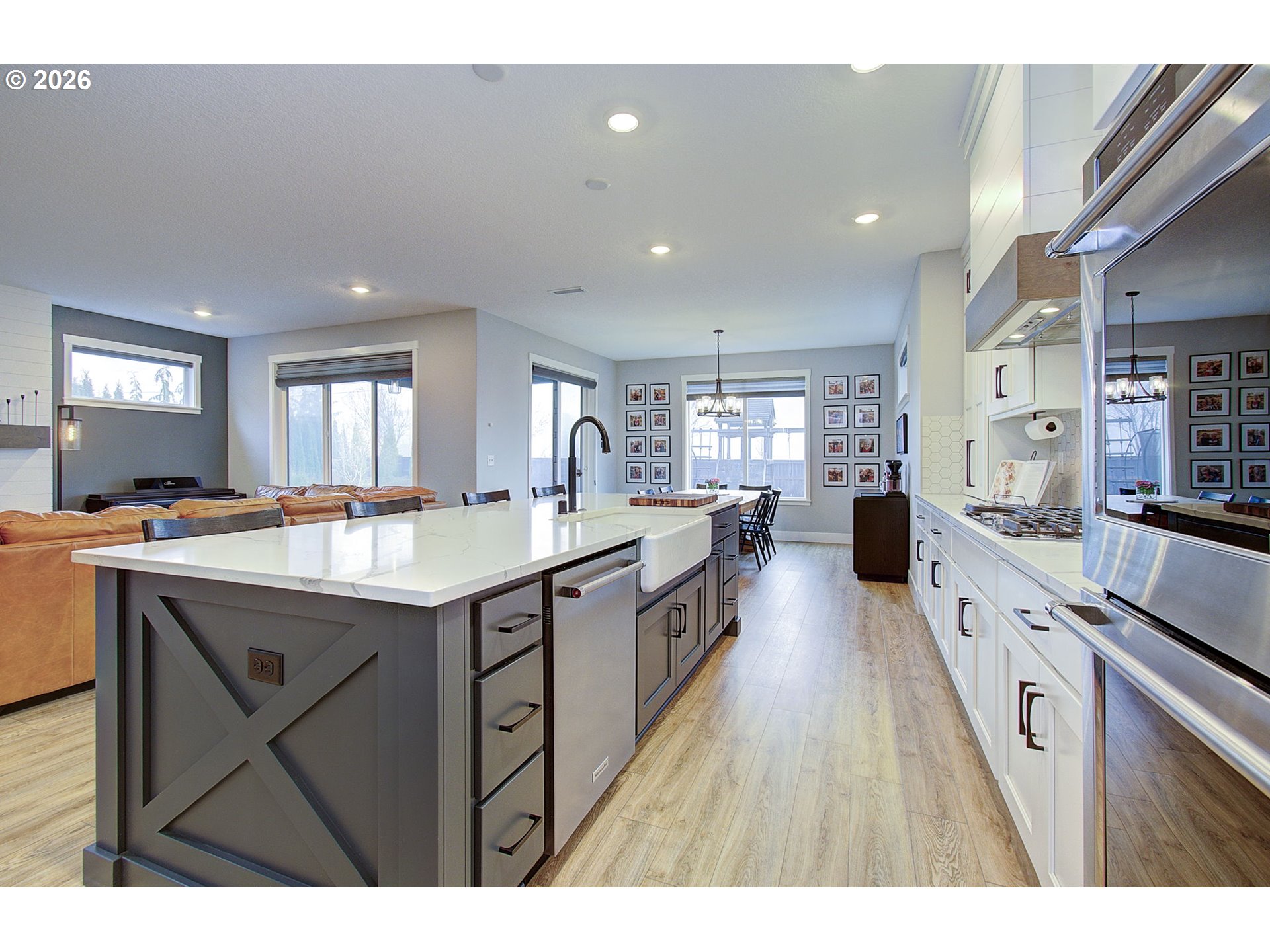 2831 Northeast 9th Avenue Battle Ground, WA 98604 - Photo 17 of 43 a large kitchen with stainless steel appliances lots of counter space and breakfast area