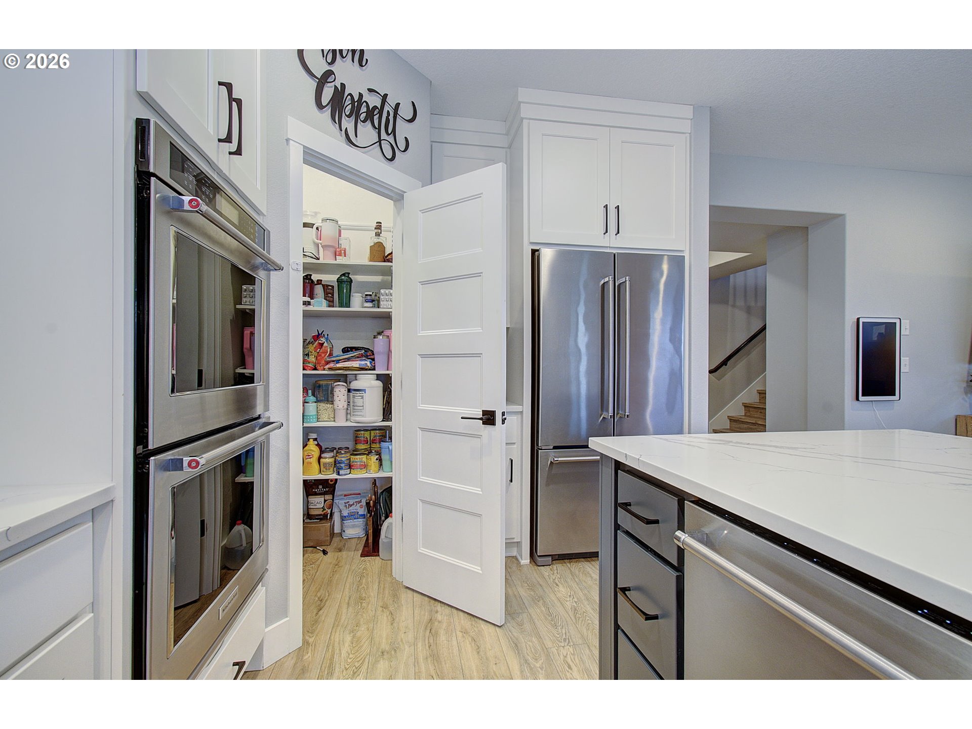 2831 Northeast 9th Avenue Battle Ground, WA 98604 - Photo 18 of 43 a open kitchen with stainless steel appliances granite countertop a refrigerator and a sink