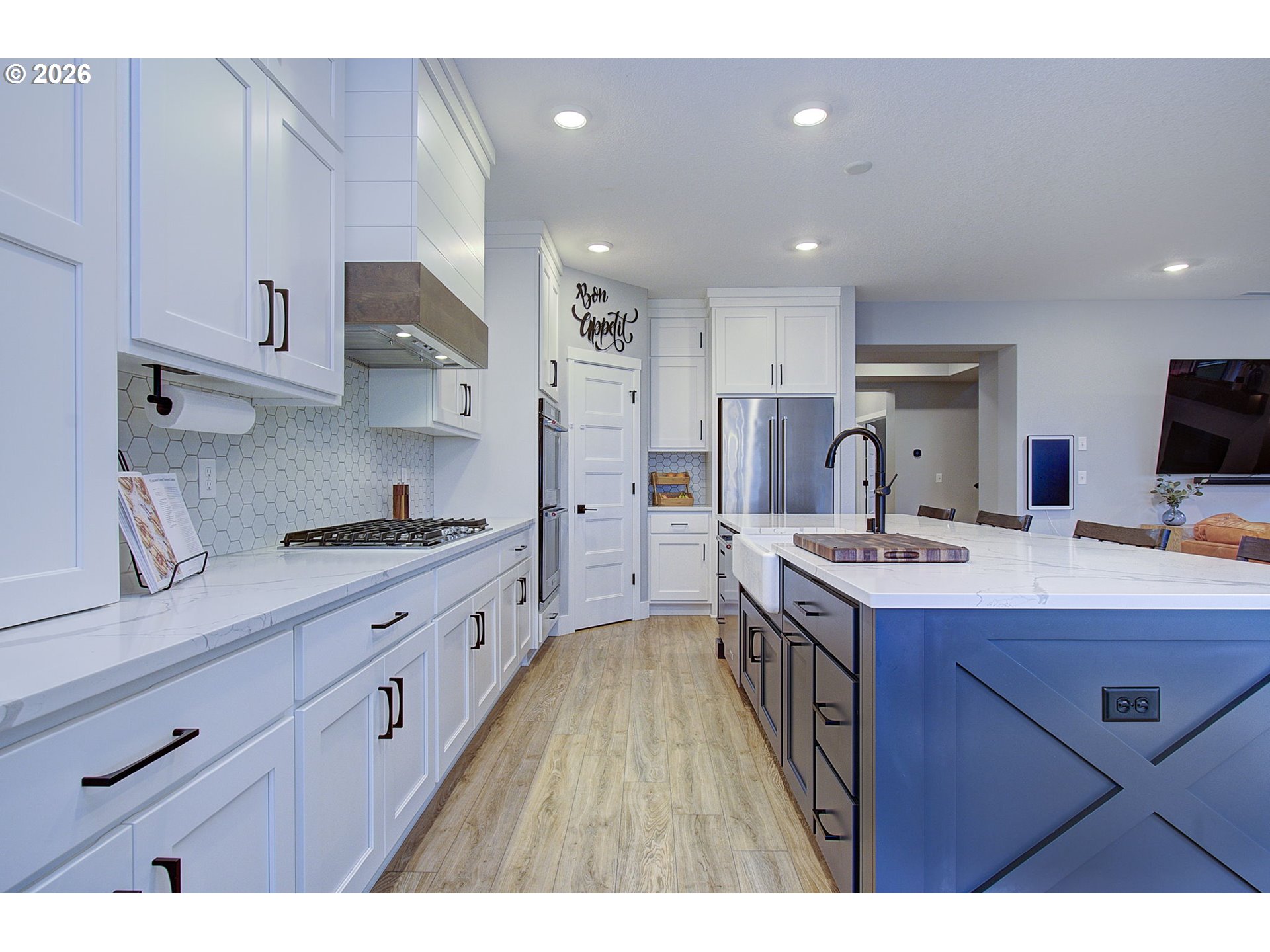 2831 Northeast 9th Avenue Battle Ground, WA 98604 - Photo 19 of 43 a kitchen with granite countertop a sink stove top oven and cabinets