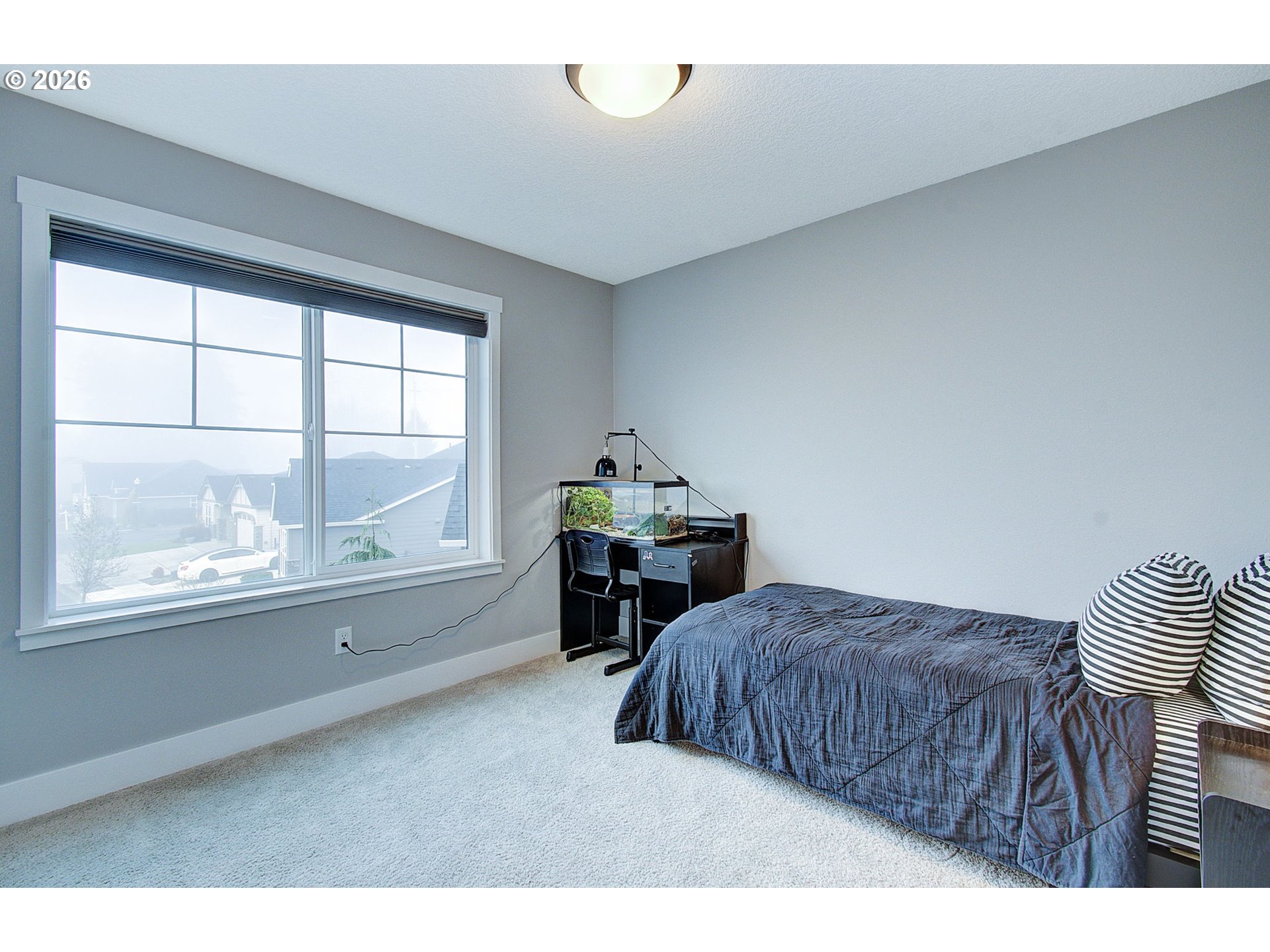 2831 Northeast 9th Avenue Battle Ground, WA 98604 - Photo 20 of 43 a bedroom with furniture and a window