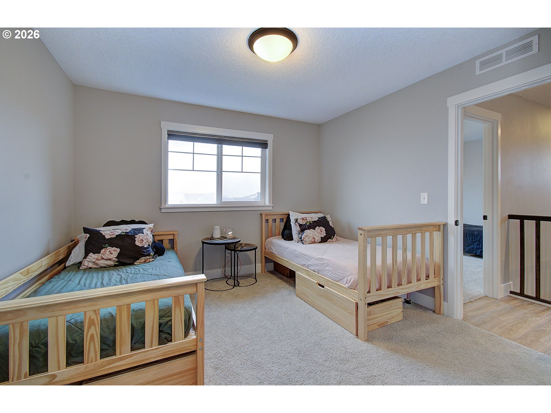 2831 Northeast 9th Avenue Battle Ground, WA 98604 - Photo 26 of 43 a bedroom with furniture and a window